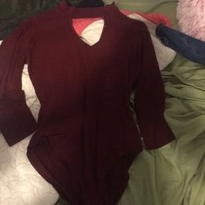 Red body suit, v neck cut
